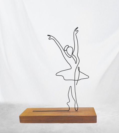 Ballerina Wire Art Sculpture tabletop decor. Hand-shaped from single steel wire, sitting on a solid fir tree coaster. The wire is colored with matte black acrylic paint, and the coaster is colored with an eco-friendly teak tree wood protector. Ballerina Drawing, Minimal Home Decor, Drawing Female, Drawing Female Body, Diy Plaster, Wire Art Sculpture, Black Acrylic Paint, Kids Art Class, Diy Bottle Crafts