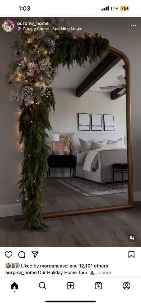 Christmas Tree And Mirror, Gold Mirror Christmas Decor, Christmas Garland Ideas Mirror, Garland Mirror Decor, Mirrors Decorated For Christmas, Floor Mirror Christmas Decor, Christmas Tree In Front Of Mirror, Mirror With Garland, Christmas Garland Over Mirror