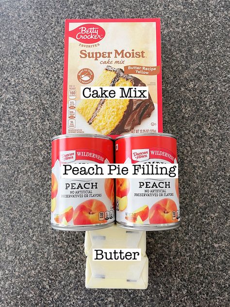 Looking for a quick and delicious dessert? Try this easy peach cobbler made with canned peach pie filling, cake mix, and melted butter! With just three ingredients, you can whip up a sweet, buttery treat perfect for any occasion. Save this pin for a simple and tasty dessert idea! Peach Cobbler With Canned Biscuits, Desserts With Peach Pie Filling, Peach Dump Cobbler 3 Ingredients, 2 Ingredient Cobbler, Peach Cobbler Box Cake Recipe, Peach Pie Filling Cobbler, Peach Cobbler Easy Canned Pie Fillings, Canned Peach Cobbler Recipe Cake Mixes, Peach Cobbler With Peach Pie Filling