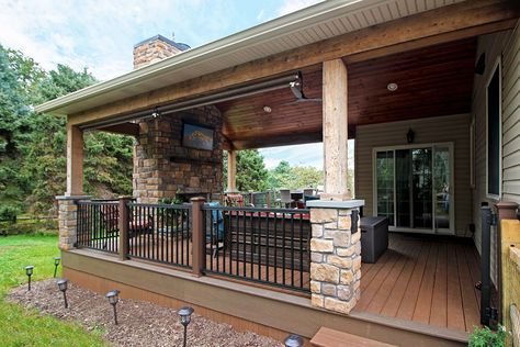 Beck - TimberTech deck and porch with fireplace and TV Porch With Fireplace, Fireplace And Tv, Deck Fireplace, Patio Layout, Porch Fireplace, Deck Stairs, Stone Columns, Outdoor Entertainment, Deck With Pergola