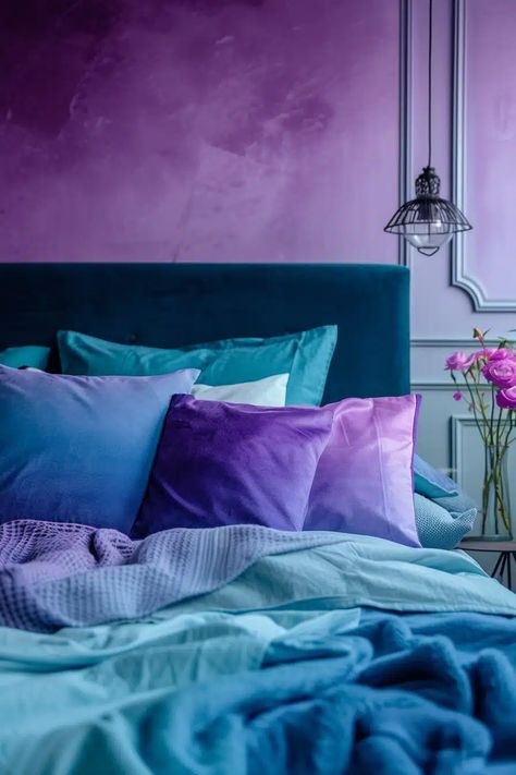 25 Chic Blue and Purple Bedroom Ideas for a Unique Sleep Space - Roomy Retreat Purple And Teal Bedding Sets, Pink Purple Turquoise Bedroom, Purple Blue And Green Bedroom Ideas, Pink Purple Blue Bedroom, Purple Wall Painting Ideas Bedroom, Purple And Green Bedroom Ideas, Blue And Purple Bedroom Ideas, Turquoise Bedroom Ideas For Adults, Purple And Teal Bedroom