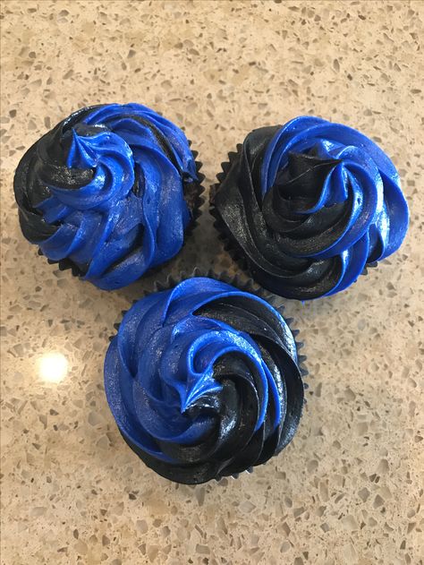 Black and blue cupcakes  Police cupcakes Police Birthday Cupcakes, Police Themed Cupcakes, Cop Cake Ideas, Black And Blue Cupcakes, Police Cupcakes Ideas, Police Graduation Cake, Police Banquet, Police Cupcakes, Police Party Favors