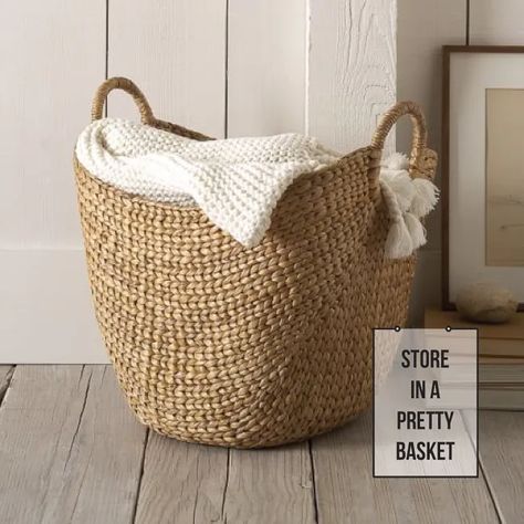 5 Clever Ways to Incorporate Blanket Storage In Your Home - Francois et Moi Basket Decor, Blanket Basket, Seagrass Basket, Nicolas Cage, Water Hyacinth, Blanket Storage, Wooden Floor, Large Baskets, Woven Basket