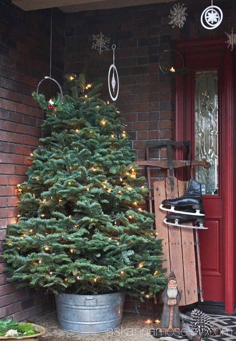 A Christmasy front porch tour - Ask Anna Traditional Christmas Front Porch, Christmas Trees On Front Porch, Porch Christmas Tree Ideas, Christmas Tree Front Porch, Front Porch Christmas Tree, Porch Christmas Tree, Christmas Porches, Porch Trees, Stone Porches