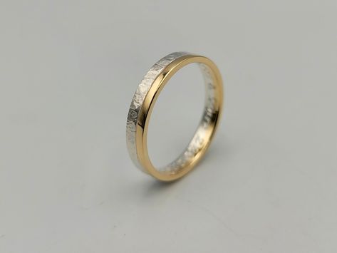 "This is a two tone hammered ring which consists of one ring made of sterling silver and another made of 14K gold which have been soldered together. The silver is hammered and the gold part in contrast is glossy. A unique wedding ring comfortable to wear from men and women! It is a made of order ring and you can choose either 4.5mm width as a wider option or 3.5mm width a thinner one. The first has 3.0mm sterling silver and 1.5mm 14K gold and the thinner has 2.00mm silver and 1.5mm 14K gold. DET Mens Wedding Rings Gold And Silver, Wedding Ring Mixed Metals, White And Yellow Gold Ring, Silver And Gold Wedding Rings Mixed Metals, Two Tone Engagement Ring Mixed Metals, Mixed Metal Wedding Ring, Gold And Silver Wedding Band, Silver And Gold Jewelry Mixing, Mixed Metal Wedding Band