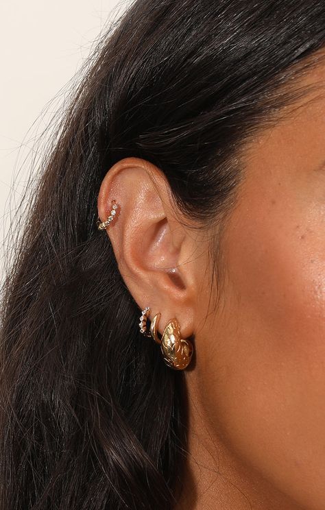 Dainty cartilage earrings that make a bold statement. Perfect for stacking and available in gold, silver and rose gold. Shop now! Piercing Collection, Cartilage Hoop Earrings, Cartilage Earrings Hoop, Cartilage Hoop, White Crystals, Silver Jewels, Sell Gold, Helix Piercing, Earrings Studs