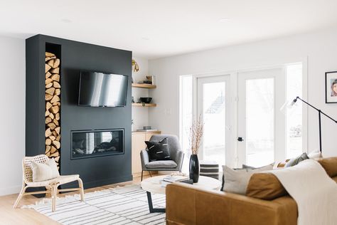 Just 7 Scandinavian Fireplaces That You'll Want to Curl Up Next To Scandinavian Fireplace Ideas, Scandinavian Fireplace, Basement Fireplace, Black Feature Wall, Living Room Fireplace, Wood Columns, Bright Walls, Dining Room Light Fixtures, Dark Walls