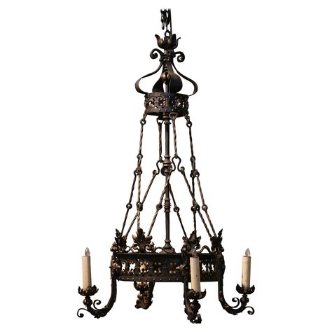 19th Century French Gothic Black and Gilt Wrought Iron Four-Light Chandelier For Sale at 1stDibs 19th Century Antiques, Tall Chandelier, Medieval Chandelier, Chandelier Victorian, Wrought Iron Light Fixtures, Gothic Chandelier, Victorian Chandelier, Wrought Iron Lights, French Gothic