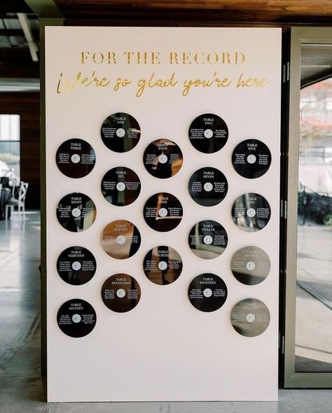 Record Wall Wedding, Disco Seating Chart Wedding, Unique Wedding Diy, Boho Disco Wedding Centerpieces, Old English Wedding Theme, Music Venue Wedding, Party Booth Ideas, Disco Seating Chart, Record Seating Chart Wedding