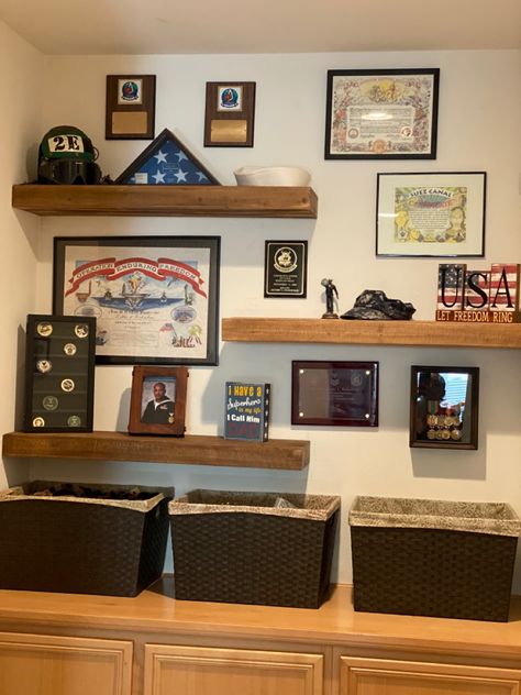 Wall Of Awards Ideas, Army Awards Display Wall, Air Force Office Decor, Army Wall Decor Ideas, Award Plaque Wall Display Ideas, Marine Corps Room Ideas, Army Office Decor, Veteran Shadow Box Ideas, Office Award Display