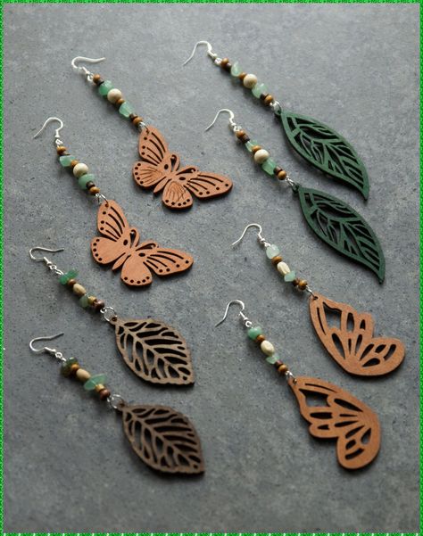 [PaidAd] Handmade Dangle Earrings Made With Beads, Crystals, And Wood #woodenearringshandmade Wood Leaf Earrings, Cricut Wood Jewelry, Laser Engraved Jewelry Ideas, Handmade Wood Earrings, Wood Accessories Jewellery, Wood Earrings Handmade, Laser Earrings Design, Wooden Jewelry Handmade, Wooden Earrings Diy