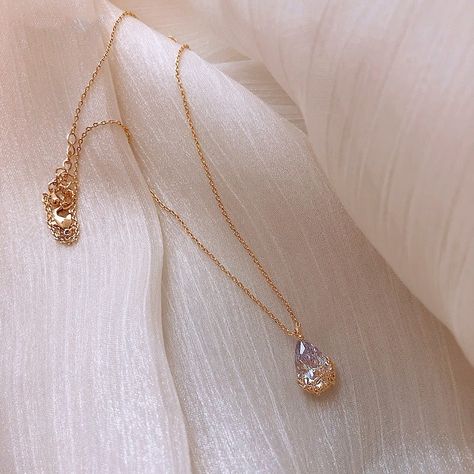 A drop in the water 💧 our water drop necklace is a must have 🫢 • • #jewellery #jewelry #fashion #earrings #necklace #gold #accessories #jewellerydesign #bracelet #jewelryaddict #jewelrydesign #jewellerylover #daisybellissimo Crystal Water, Drop Pendant Necklace, Crystal Necklace Pendant, Simple Jewelry, Minimalist Necklace, Simple Necklace, Drop Necklace, Water Drop, Drop Pendant