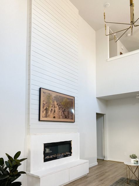 How to install a DIY two-story electric fireplace Two Story Electric Fireplace, Two Story Faux Fireplace, Two Story Tall Fireplace, Electric Fireplace Tall Wall, Floor To Ceiling Electric Fireplace, Diy 2 Story Fireplace, Electric Fireplace Ideas With Tv Tall Ceilings, High Ceiling Electric Fireplace Wall, Diy Fireplace High Ceiling