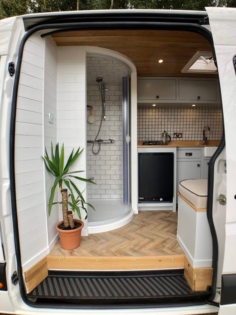 https://www.livinginashoebox.com/this-custom-built-campervan-makes-on-the-road-living-easy/ Quirky Campervan Interiors, Van Conversion Shower, Quirky Campers, Conversion Van, White Van, Bus Living, Kombi Home, Van Conversion Interior, Build A Camper Van