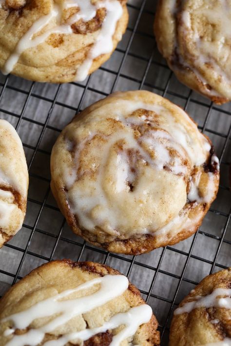 Cinnamon Roll Cookies are thick, soft, buttery cookies, swirled with cinnamon sugar and topped with sweet icing. All the flavors of a cinnamon roll in a soft, epic cookie! #cookiesandcups #cinnamonroll #cookierecipe #cinnamonrollcookies Unique Cookie Flavors, Cinnamon Sugar Desserts, Best Snickerdoodle Cookies, Recipe Cookies, Cinnamon Roll Cookies, Cinnamon Cookies, Cinnamon Roll Cake, Unique Cookies, Roll Cookies