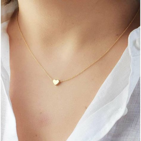 Excited to share the latest addition to my #etsy shop: Dainty Gold Tone Heart Necklace - Initial Heart Charm Necklace - Tiny Heart Pendant Necklace https://ift.tt/2NQ5pZY Gold Heart Choker, Dainty Diamond Necklace, Heart Charm Necklace, Necklace Initial, Heart Choker, Sterling Necklaces, Gold Heart Necklace, Tiny Heart, Necklace Choker