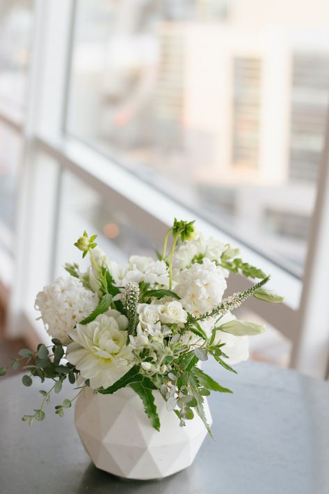 white flowers in white vase White Vase Flower Arrangement, White And Green Vase Arrangements, Small All White Flower Arrangements, Cocktail Floral Arrangements, Cocktail Table Arrangement Wedding, Confirmation Flower Arrangements, Small Cocktail Table Arrangements, Small White Floral Centerpieces, Small White Flower Centerpieces