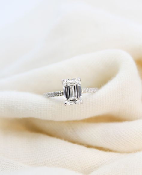 A little something classy and timeless! ✨💍 You can't go wrong with a stunning classic like this ring! The emerald cut diamond center stone perfectly slims your finger while the pavé band and hidden halo add the perfect amount of sparkle! Engagement Ring With Pave Band, Engagement Ring Emerald Cut, Emerald Cut Engagement Ring, Engagement Ring Emerald, Ring Emerald Cut, Emerald Cut Engagement, Emerald Engagement Ring Cut, Pave Band, Emerald Cut Diamond