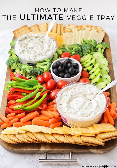 Impress your guests with this beautiful, festive and healthy veggie tray!  This savory appetizer is a perfect compliment to any party.  It's quick and easy to put together, and there's something for everyone to enjoy! #vegetables #vegetabletrayideas #veggietrayideas #vegetabletraydisplay #veggieplatter #veggietray via @somewhatsimple Dinner Boards, Charcuterie Ideas, Entertaining Food, Healthy Appetizer, Healthy Veggie, Vegetable Tray, Cold Side, Vegetable Platter, Snack Platter