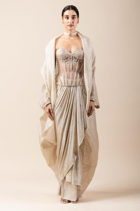 Buy White Foil Jersey Sweetheart Neck Balloon Cape And Draped Skirt Set For Women by Tarun Tahiliani Online at Aza Fashions. White Foil, Draping Fashion, Gaun Fashion, Wedding Blouse Designs, Traditional Indian Outfits, Tarun Tahiliani, Draped Skirt, Saree Trends, Party Wear Indian Dresses