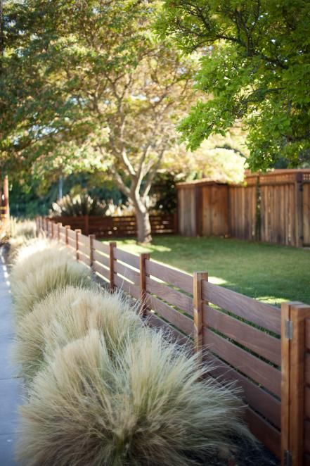 HGTV Magazine took a spin through neighborhoods all around the U.S. and found eye-catching houses worth a closer look. Gard Modern, Pagar Modern, Short Fence, Wood Fence Design, Hgtv Garden, Front Fence, Horizontal Fence, Fence Styles, Front Yard Fence