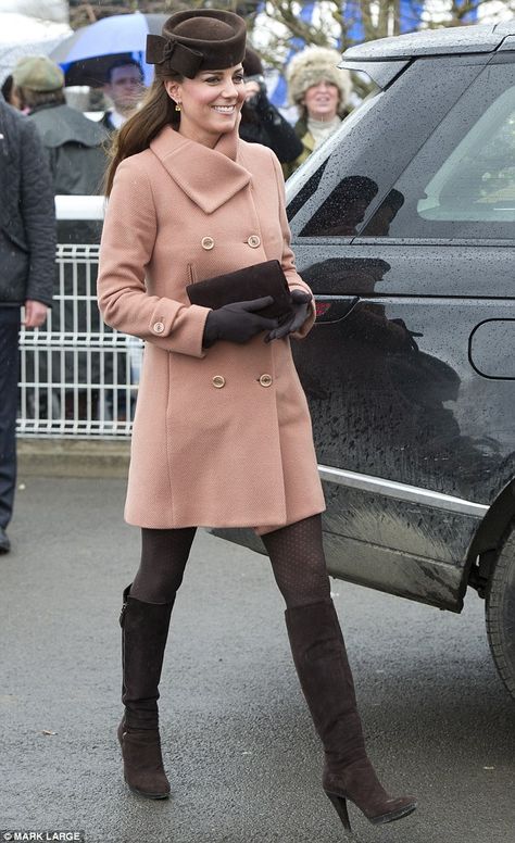 Duchess-Cambridge enjoyed a day out at the Cheltenham Festival.  She paired her peachy coat - one that she had worn previously before her marriage to William - with all-brown accessories - the £240 Betty Boop hat from Lock & Co, brown Rumba boots from Aquatalia by Marvin K, £488, and a matching brown clutch bag Ducesa Kate, Moda Kate Middleton, Cheltenham Races, Duchesse Kate, Düşes Kate, Princesse Kate Middleton, Brown Tights, Looks Kate Middleton, Cheltenham Festival