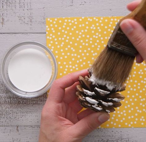 Coloring Pine Cones, Pine Cones On A Stick, Painting Pine Cones For Christmas, Pine Comes, How To Color Pine Cones, Pine Cones Painting, Painting Pine Cones Diy, How To Dye Pine Cones, Spray Painted Pine Cones