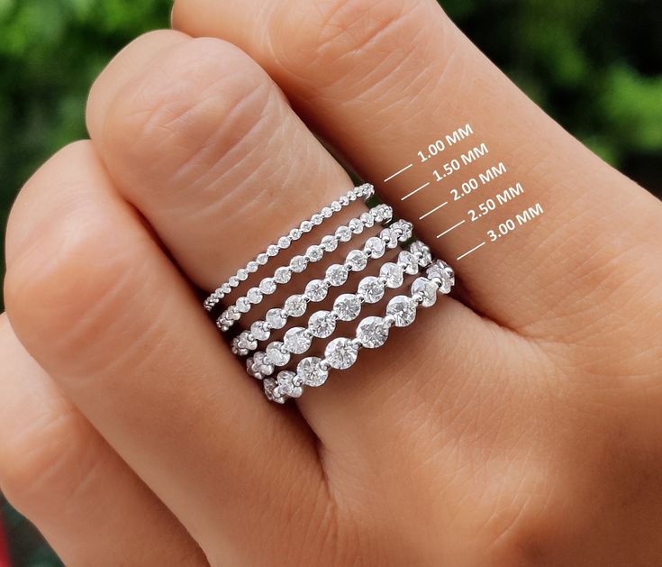 💢 𝐈𝐭𝐞𝐦 𝐃𝐞𝐬𝐜𝐫𝐢𝐩𝐭𝐢𝐨𝐧 💢 Floating Bubble Wedding Band Women / Single Prong Set Full Eternity Band / Floating Moissanite Stacking Rings / Bridal Round Stone Band 💢 𝐀𝐕𝐀𝐈𝐋𝐀𝐁𝐋𝐄 𝐌𝐄𝐓𝐀𝐋𝐒 💢 ✶ Solid 925 Sterling Silver, Solid 10K, 14K, 18K White, Yellow & Rose Gold 💢 𝐒𝐓𝐎𝐍𝐄 💢 ✶ Stone Shape : Round Cut ✶ Stone Type : Moissanite  ✶ Carat Weight : 0.18 Ct To 2.80 Ct (Depends On Finger Size) ✶ Moissanite Color : Colorless ✶ Moissanite Clarity : VVS1   💢 𝐓𝐎𝐓𝐀𝐋 𝐂𝐀𝐑? Stack Diamond Rings, Stackable Lab Grown Diamond Jewelry For Wedding, Stackable Lab-grown Diamond Jewelry For Wedding, Dazzling Stackable Wedding Jewelry, Stackable Fine Jewelry Eternity Band For Wedding, Dazzling Stackable Eternity Band For Wedding, Stackable Eternity Band For Weddings, Stackable Round Cut Moissanite Diamond Ring, Stackable Wedding Eternity Band In Fine Jewelry