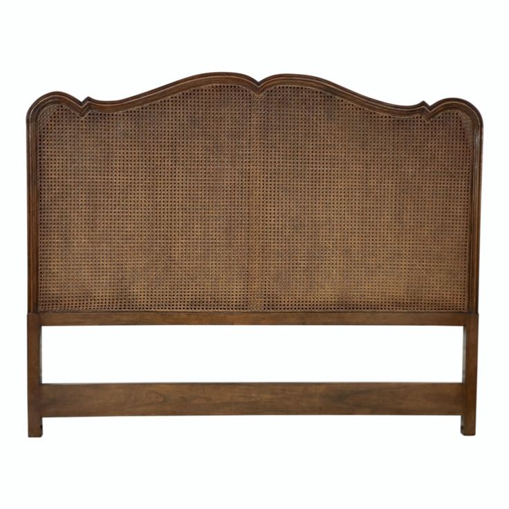 the headboard is made with wicker and wood