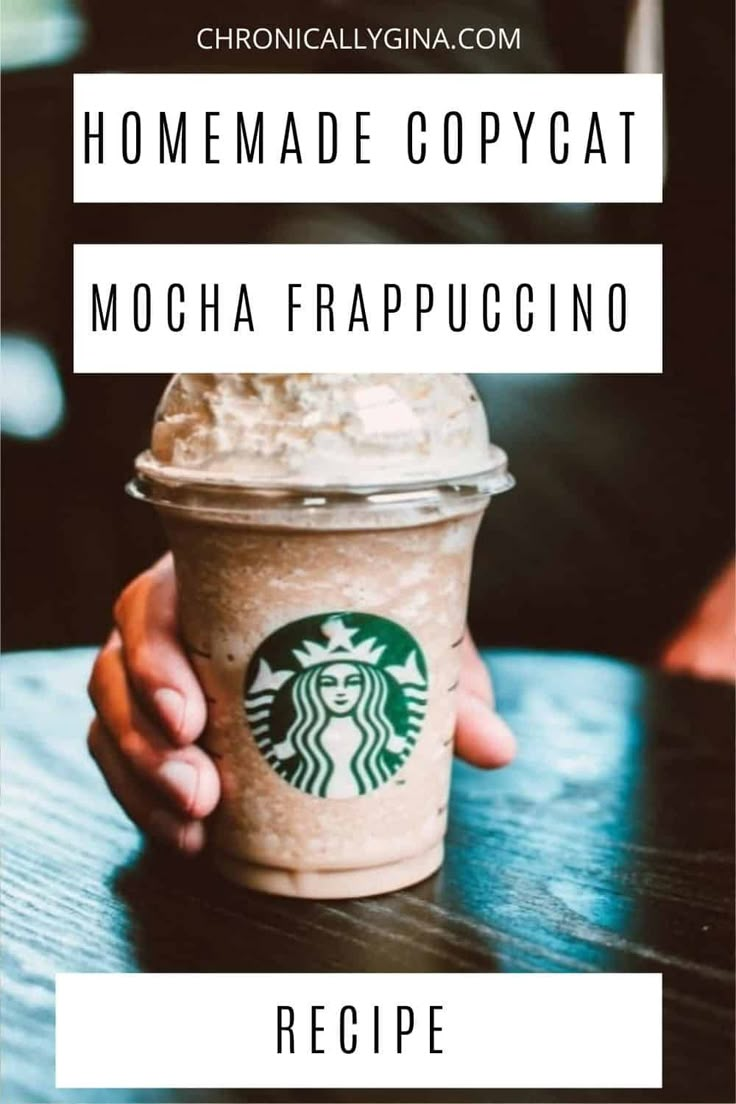 someone holding up a cup of coffee with the words homemade copycat mocha frappuccino