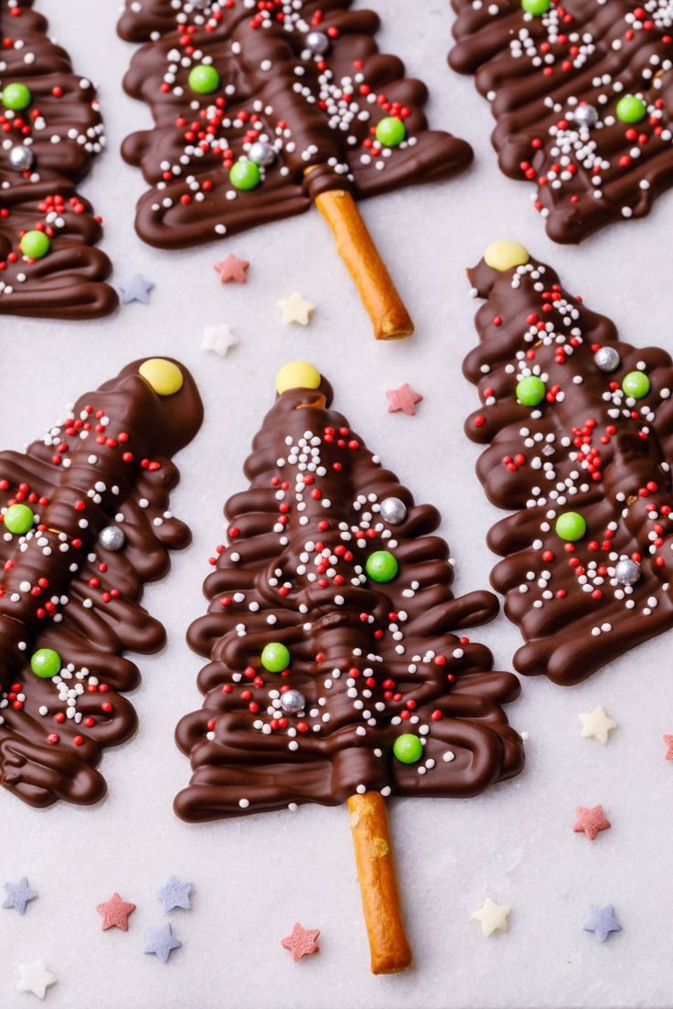 chocolate christmas tree cookies on a baking sheet