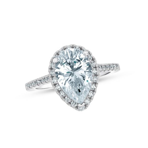 Bold and timeless, this diamond engagement ring ensures an unforgettable moment. Fashioned in 14K white gold, this beautiful look dazzles with a 1 ct. GIA-graded pear-shaped diamond boasting a color rank of I and clarity of Si2. Round diamonds line the frame and shank for a thoroughly sparkling design. Captivating with 1-1/3 cts. t.w. of diamonds and a bright polished shine, this engagement ring is worthy of her affection. This style arrives with a certificate that includes a photo and descripti Classic Diamond White Halo Ring For Proposal, Lab Grown Diamond Heart Cut Wedding Ring, Pear-shaped Diamond White Moissanite Wedding Ring, Pear-shaped Moissanite Promise Ring, Heart Cut Lab-grown Diamond Ring With Diamond Cut, Timeless Halo Ring For Proposal With Brilliant Cut, Timeless Brilliant Cut Halo Ring For Proposal, Proposal Ring With Pear-shaped Brilliant Cut, Luxury Pear-shaped Diamond Ring With Halo Setting