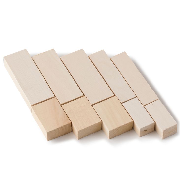 wooden blocks lined up on top of each other with one block missing from the middle