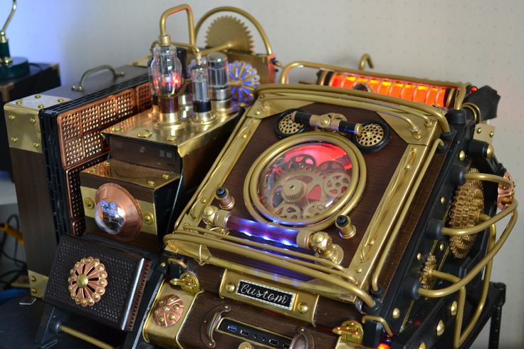 an old fashioned clock sitting on top of a table