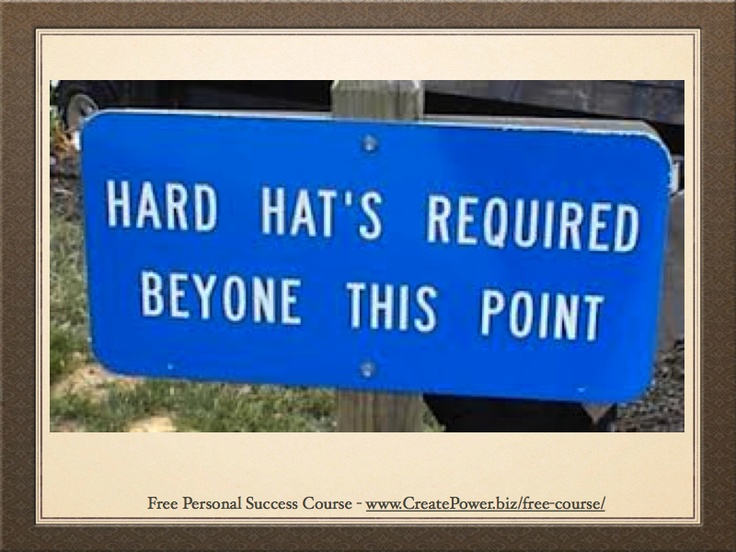 a blue sign that says, hard hat's required beyond this point