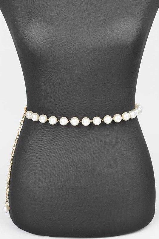 Accentuate your style with the Pearl Station Iconic Chain Belt. This elegant accessory features a chain design adorned with delicate pearls, adding a touch of sophistication to any outfit. Elevate your wardrobe with this iconic and versatile piece. One Size / AdjustableWidth - 0.65"Length - 47"Composition - PVC, Lead & Nickel Compliant Chain Belts, Chain Design, Novelty Socks, Chain Belt, The Pearl, Elegant Accessories, Fashion Socks, Kurti Designs, Belts For Women