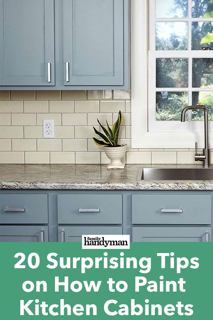 blue cabinets in a kitchen with the title 20 surprising tips on how to paint kitchen cabinets