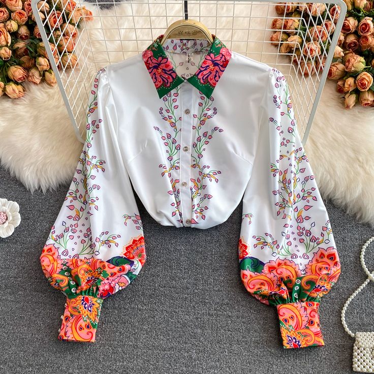 Stylish floral long sleeve topsFabric: blendedColor: picture ecolorSize(cm): M, L, XL, 2XLM length 65 bust 94 sleeve length 65L length 66 bust 98 sleeve length 66XL length 67 bust 102 sleeve length 67&ltp&gt2XL length 68 bust 106 sleeve length 68&lt/p&gt&ltbr/&gt White Long Sleeve Patchwork Top, Fall Multicolor Lantern Sleeve Blouse, Multicolor Printed Lantern Sleeve Blouse, Multicolor Lantern Sleeve Printed Blouse, Multicolor Printed Blouse With Lantern Sleeves, Trendy Long Sleeve Printed Blouse, Multicolor Print Long Sleeve Summer Top, Multicolor Print Long Sleeve Patchwork Top, White Floral Print Long Sleeve Blouse