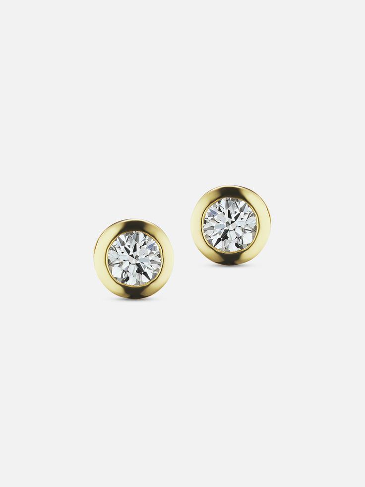 Stud earrings are a classic gold jewelry essential that are perfect for all seasons and never go out of style. The Gold Diamond Confetti Studs feature 3mm sparkling white diamonds set in luxurious polished 14K yellow gold bezel settings. 14k yellow gold 3mm white diamonds Made in New York Classic Gold Jewelry, Jewelry Essentials, Yellow Gold Earring, Gold Gilding, Classic Gold, The Gold, White Diamonds, Diamond Earrings Studs, Diamond Studs