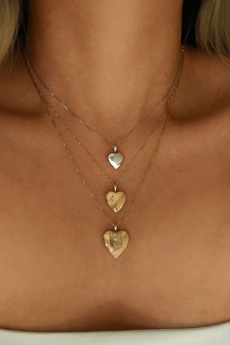 DESCRIPTIONWe heard you, white gold lovers! Get the silver look but without the tarnishing!A white gold sweet heart locket is placed on our 0.5mm Box Chain, with lots of love and nostalgia, too. Locket holds up to 2 images so be sure to include your bestie, lover, dog, or yourself...we won't judge <3 DETAILS - always made in 14k white gold- pendant measurement: 13mm x 12mm- model wears a 16” Dainty White Gold Locket Jewelry, White Gold Locket Necklace For Anniversary, Anniversary White Gold Locket Necklace, Sterling Silver White Gold Heart Charm Locket Necklace, Heart Shaped Locket Necklace In White Gold, White Gold Sterling Silver Locket Necklace With Heart Charm, Heart Shaped White Gold Locket Necklace, White Gold Heart Cut Locket Necklace, White Gold Heart-cut Locket Necklace