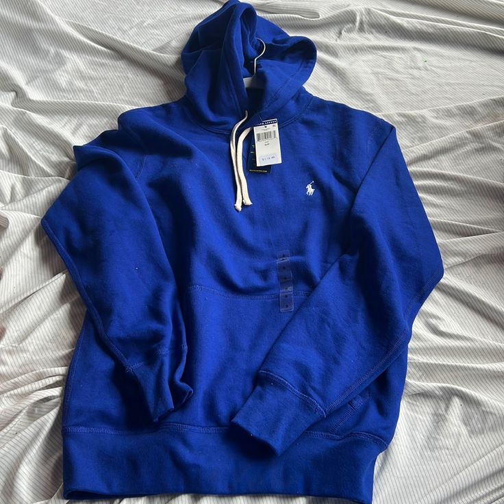 Never Been Worn Brand New Hoodie Blue Fleece Athleisure Outerwear, Casual Blue Fleece Outerwear, Blue Athleisure Hooded Jacket For Fall, Navy Hoodie With Adjustable Hood For Fall, Blue Fleece Hooded Jacket For Fall, Blue Athleisure Hooded Jacket With Drawstring, Blue Hooded Fleece Outerwear, Blue Athleisure Sweatshirt For Winter, Blue Fleece Outerwear With Drawstring Hood