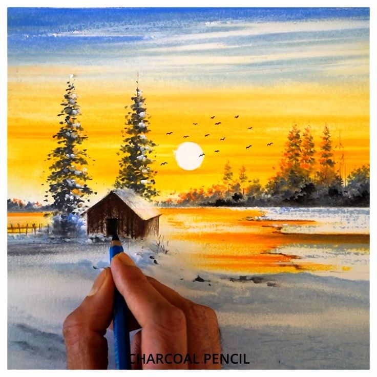 someone is painting a sunset scene with watercolors and pencils in their hands