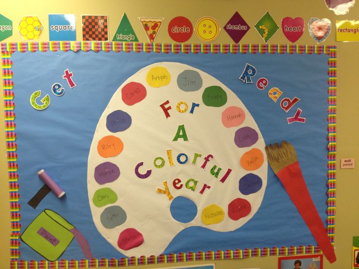 a colorful paper plate with a paintbrush on it that says ready for a colorful year