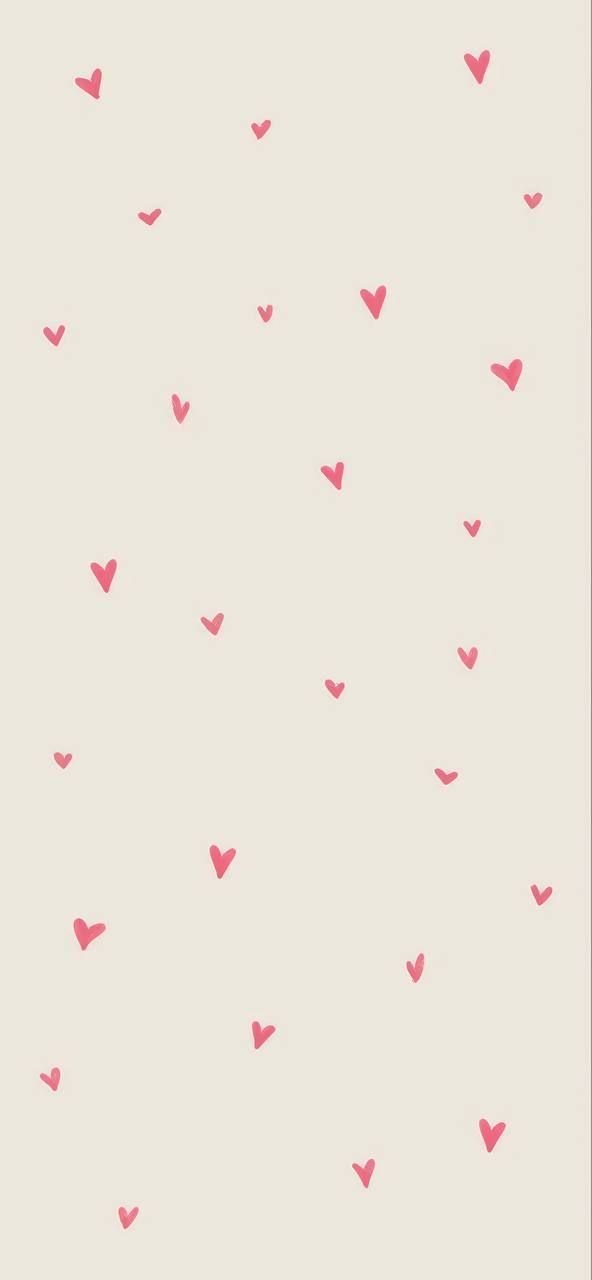 pink hearts are flying in the air on a white background with red and black dots