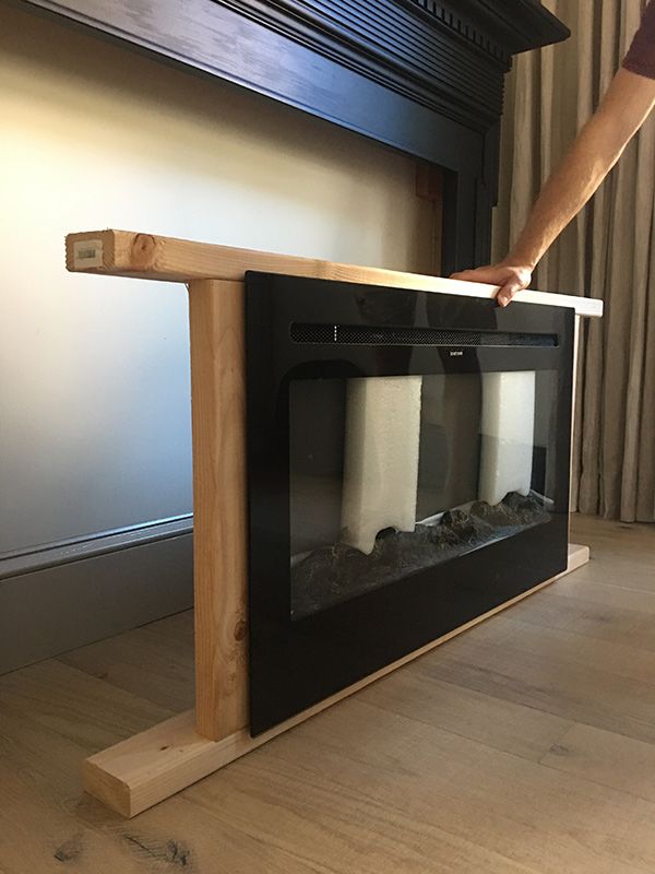 Electric Fireplace Hanging On Wall, Insert Electric Fireplace, Diy Insert Fireplace, How To Frame Out A Fireplace, Ikea Diy Fireplace, Diy Changable Art Frame, Electric Fireplace In Basement Ideas, Diy Fireplace Surround For Electric Insert, Floating Mantle Electric Fireplace