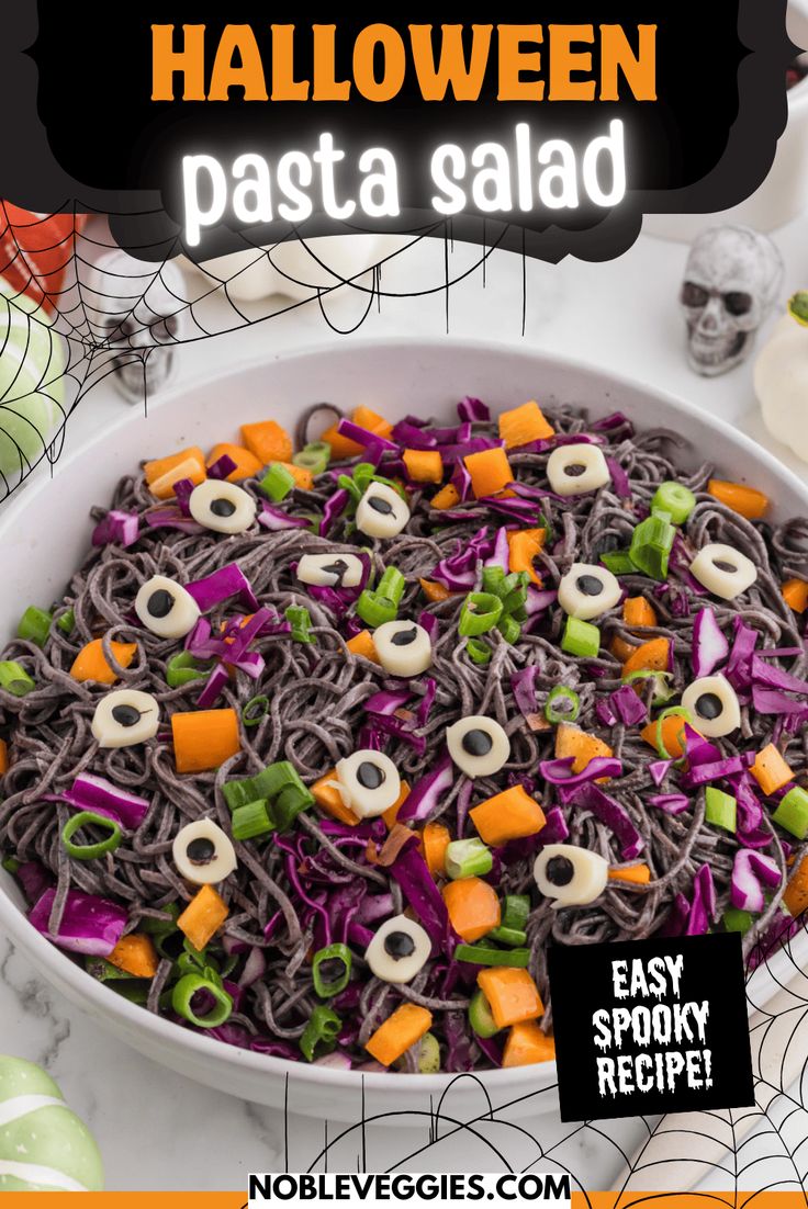 halloween pasta salad in a white bowl with spooky eyes