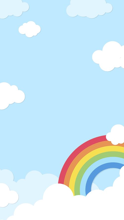 a rainbow in the sky with clouds