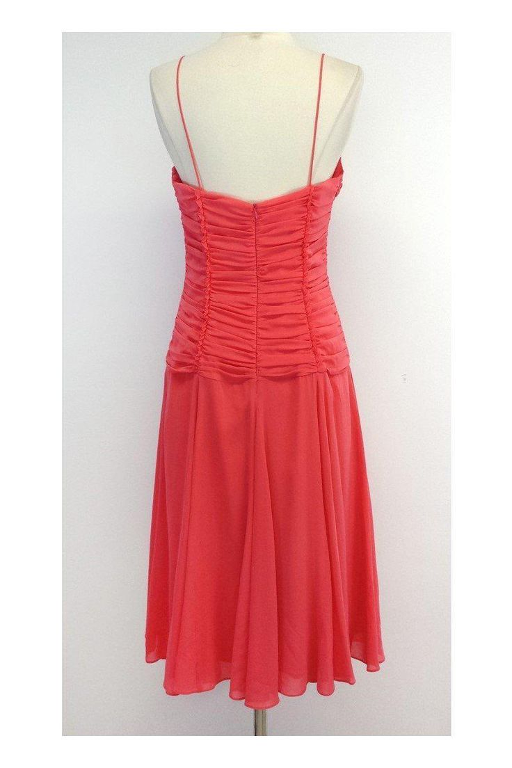 Size 10 Pink ruched dress Body 98% Silk 2% Spandex Lining 1 100% Acetate Lining 2 100% Silk Made in the USA Concealed back zip Ruched bodice Tie at bust Loose and flowing skirt Underarm to underarm 16" Waist 31" Roomy hip area Total length 44" Fitted Midi Dress With Lined Bodice And Empire Waist, Fitted Midi Dress With Empire Waist And Lined Bodice, Ruched A-line Fit And Flare Dress, Fitted Midi Dress With Smocked Back, Ruched Bodice A-line Dress, A-line Party Dress With Ruched Back, Evening Dresses With Spaghetti Straps And Ruched Back, Spaghetti Strap Evening Dress With Ruched Back, Midi Dress With Ruched Bodice And Fitted Waist