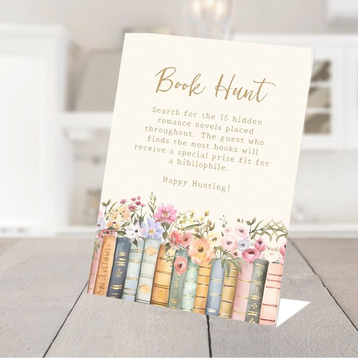 there is a card that says book hunt with books on the front and flowers on the back