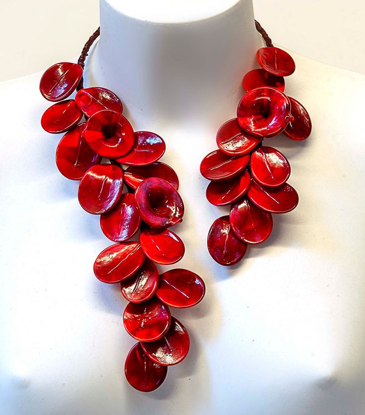 "Ornamental and wonderful Murano  glass necklace made with rigid metal and really beautiful glass red flowers and glass red leaves  made in lampworking techniques. this is very original, special, decorative and different glass necklace  the length is  12,60 inch (32 cm.).            this wonderful glass flowers necklace  is handmade according to the current fashion.  It is a necklace / sculpture suitable for important occasions and social events. ❤  Coupled earrings are also available  ❤  PERFEC Handmade Red Flower Necklace Adjustable, Handmade Red Flower Necklace With Adjustable Fit, Handmade Adjustable Red Flower Necklace, Handmade Red Flower Necklace, Red Adjustable Flower Necklace, Red Glass Bohemian Necklace, Adjustable Red Flower Beaded Necklaces, Adjustable Red Flower Beaded Necklace, Red Bohemian Flower Pendant Jewelry